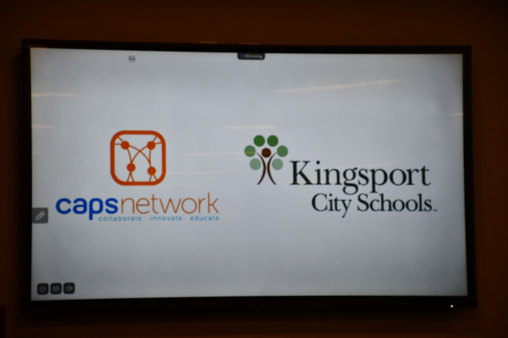 Logos of CAPS Network and Kingsport City Schools